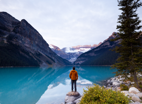 A man looking out at the lake in Alberta