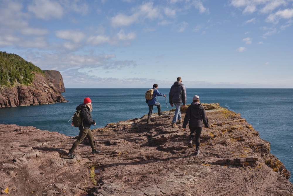 People hiking along the coast